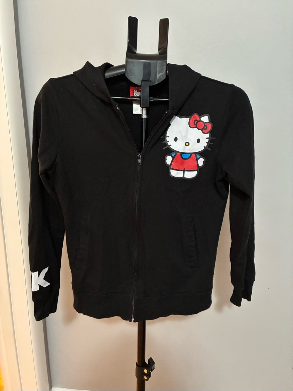 Hello Kitty Black Zip-Up Hoodie with Red Bow Graphic
